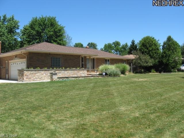 Beautiful Brick Ranch with lots to offer.