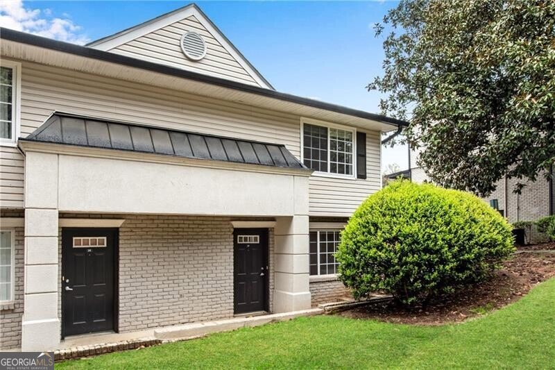 View of front of house with a front lawn