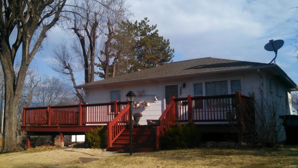 Adorable, updated Lindenwood home nestled on a corner lot and wrapped with an expansive deck is conveniently located - a great introduction to city living.