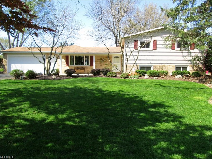 This beautiful home is landscaped to please the ey