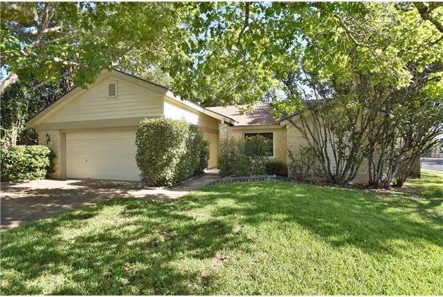 3 sides stone home, nice large corner lot.