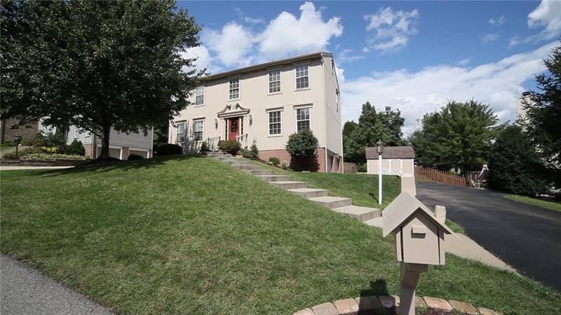 401 Monmouth Drive in Cranberry Twp - flat driveway, fanced backyard.