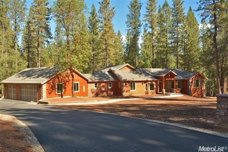 Exterior Front Of Home With 3 Car Garage