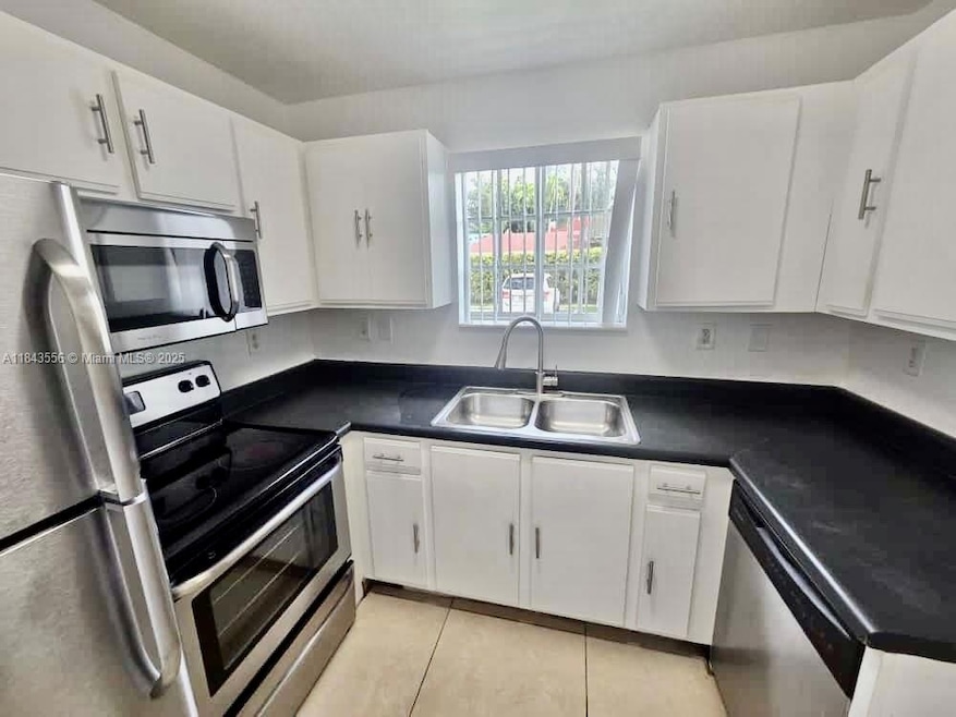 2184 NE 167th St unit 1110, North Miami Beach, FL 33162 - photo 1