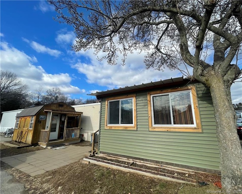 Paved walkway and shed