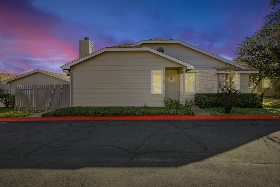 View of front of house with a chimney