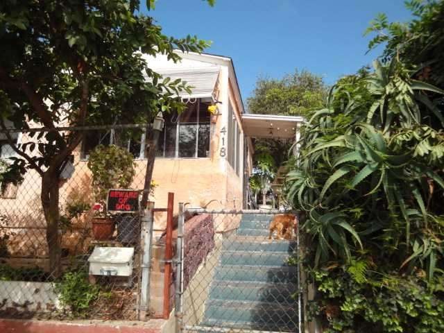 Fully Fenced Front and Back Yard