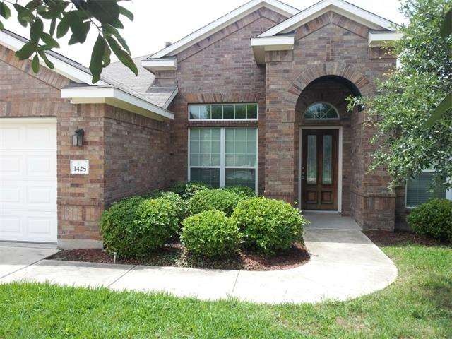 Nicely landscaped and treed front lot with eastern