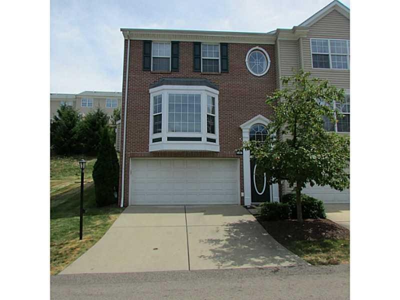 Exterior Front. End unit located on lovely quiet s