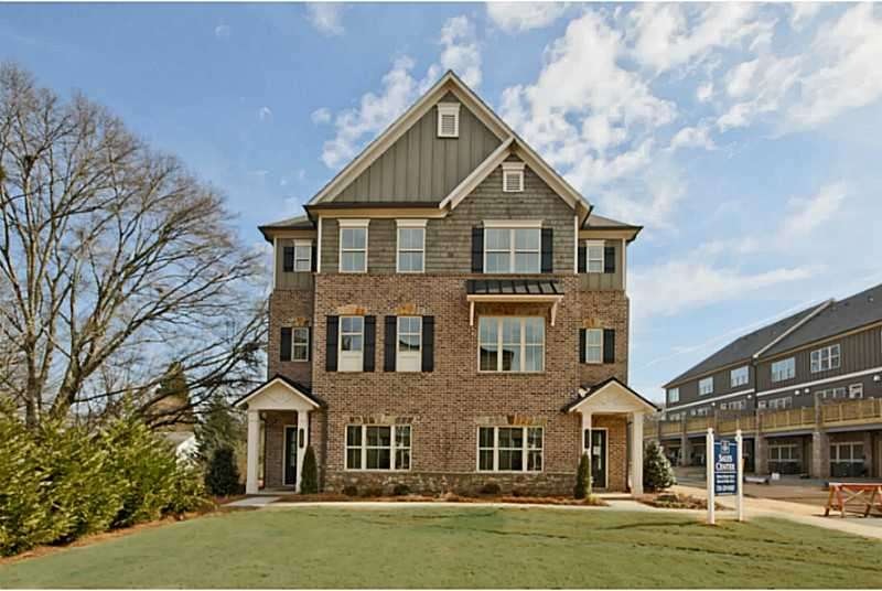 Exterior Front. Unit 21 is located on the right si