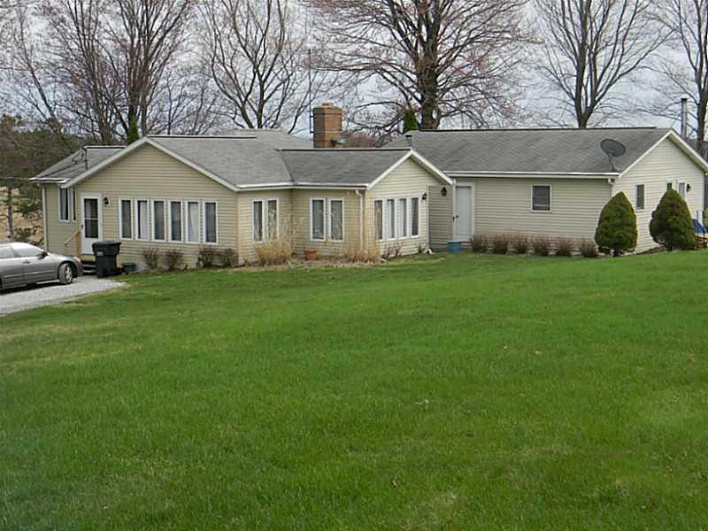 Exterior Front. side/back view of house from backy