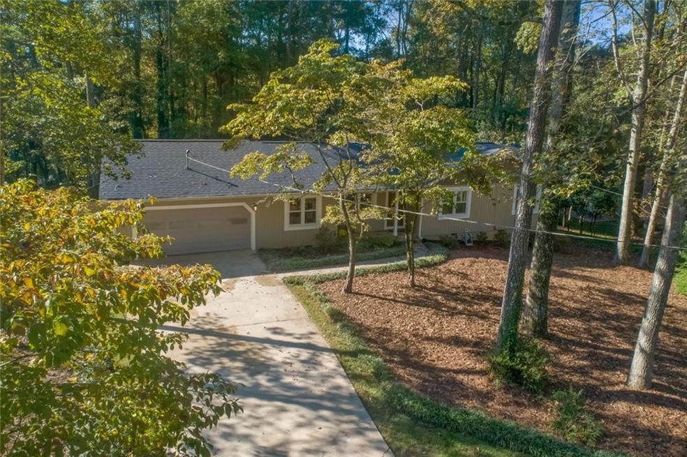 Nestled in the trees of Lake Somerset, this home h