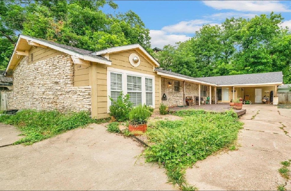 View of front of home featuring stone siding