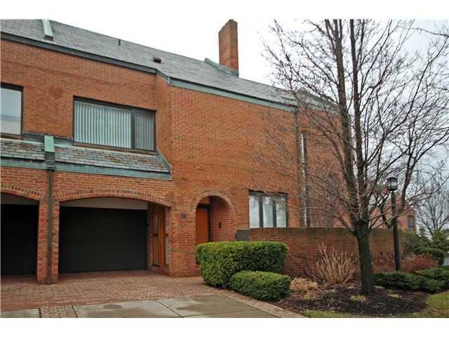 Exterior Front All brick townhouse with attached g