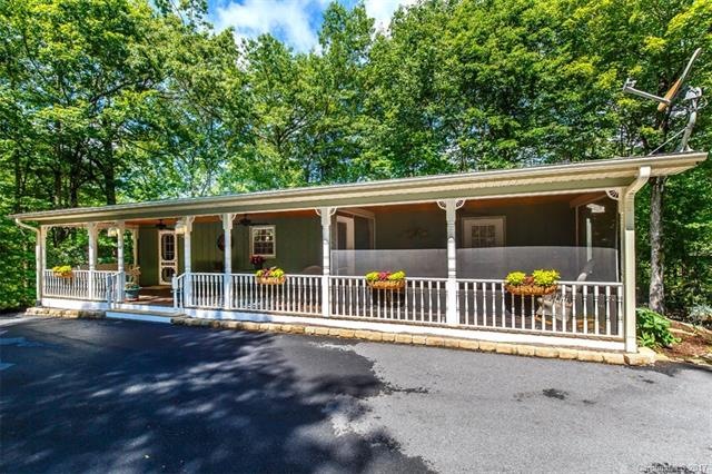 Front of Home with 50 ft of Open & Screened Porch