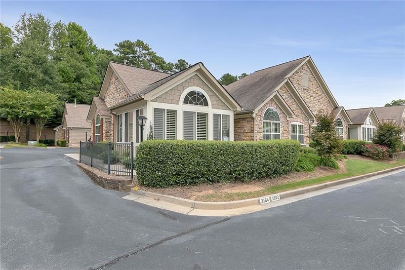 Move-in ready condo with stacked stone exterior an
