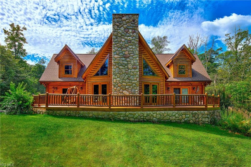 Welcome to the this amazing log home located at 9605 Beech Tree Lane in Bainbridge!