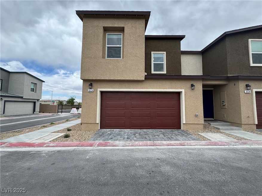 Multi unit property featuring stucco siding, an at