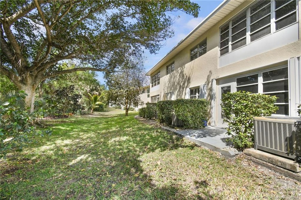 Condo Exterior - Enclosed Porch and Exterior Patio