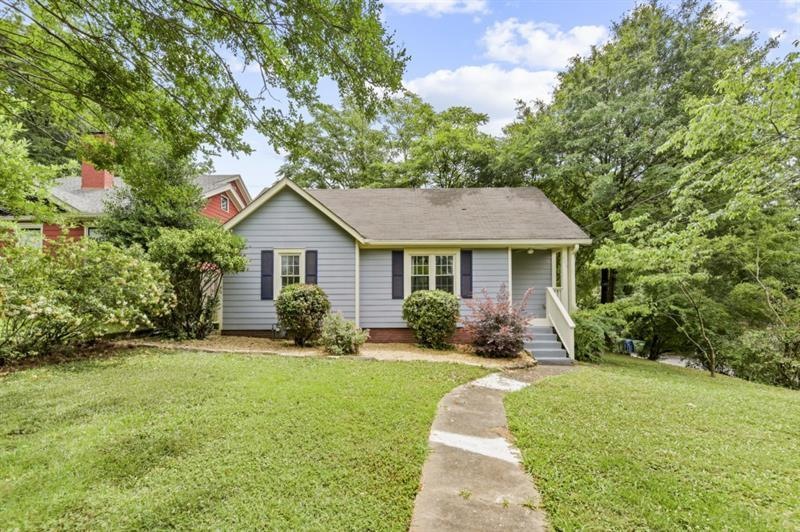 Tree-Lined And Sun-Soaked Traditional!