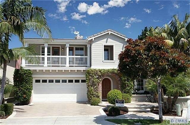 This beautiful model perfect 6 bedroom home is loc