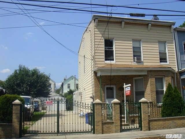 78-13 90th Ave, Woodhaven, NY 11421 - photo 1