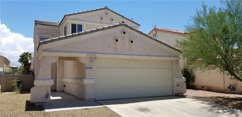 Front exterior w/2 car garage.