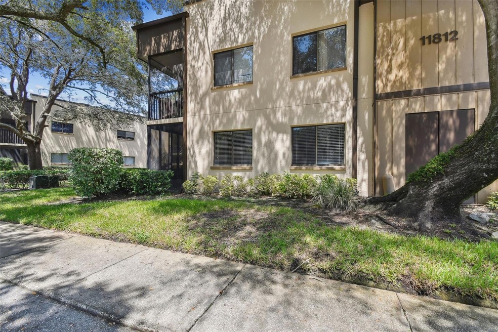 first floor shaded entrance with assigned parking