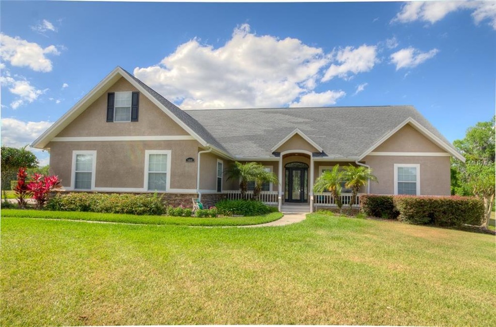 34049 Triple Crown Ct, Dade City, FL 33525 - photo 1