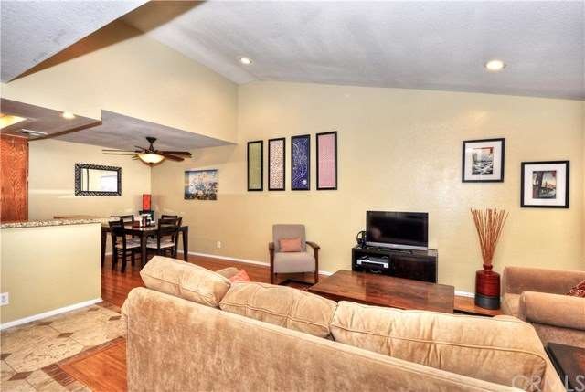 View from entry of Living Room & Eating Area. 