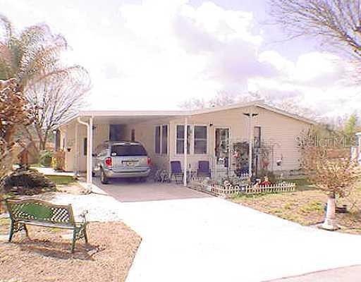 145 Jackson Park Ave, Davenport, FL 33897 - photo 1