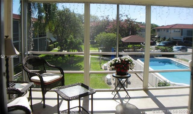 Pool and garden view from patio, living area and master