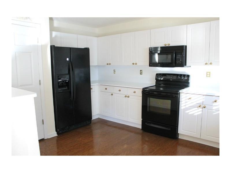 Exterior Front. Kitchen View 2