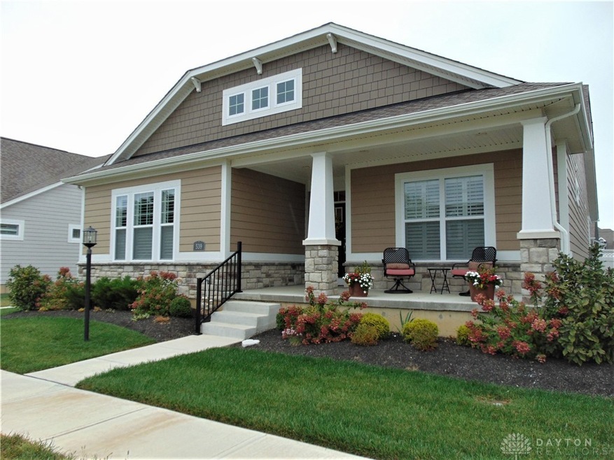 Awesome front porch, beautifully landscaped