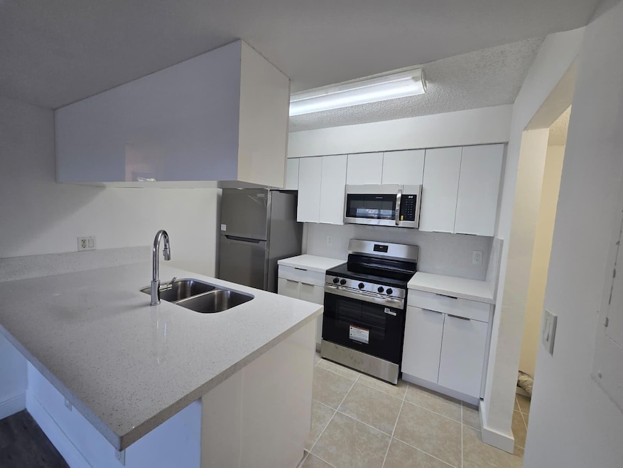 1241 SW 46th Ave unit 1002, Pompano Beach, FL 33069 - photo 1