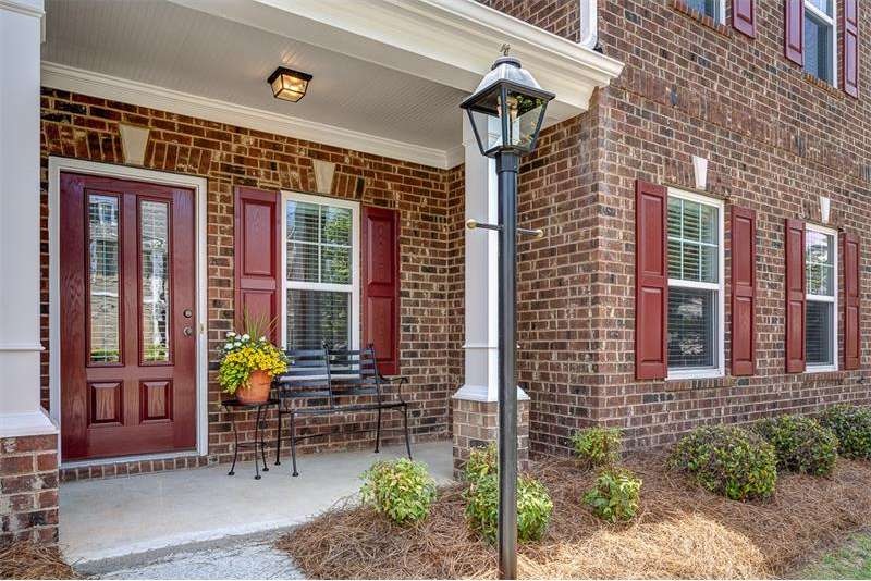Welcome Home! This Cozy Front Porch Greets You As 