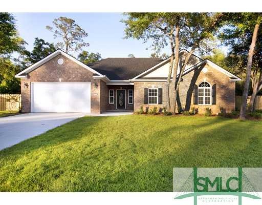 Exterior Front. Beautiful all brick home with fenced back yard