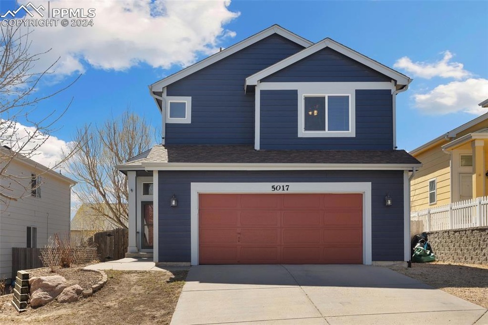 Front facade featuring a garage