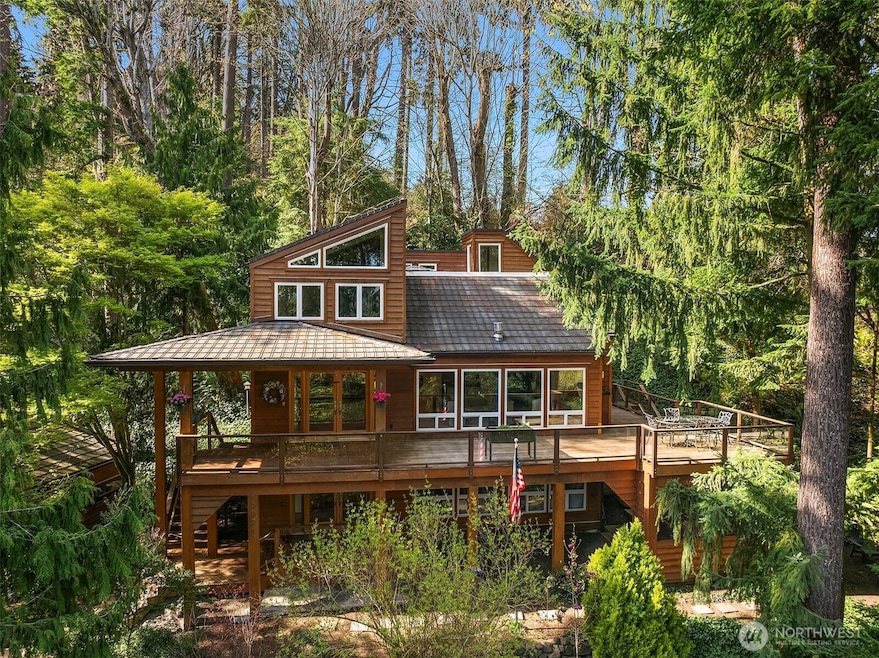 A RARE oasis, sited handsomly on E Mercer Highlands Drive.