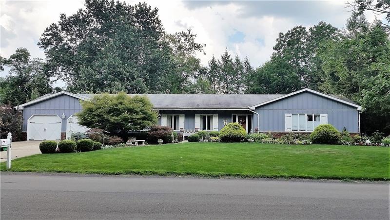 Large Ranch Home on private lot with pool.