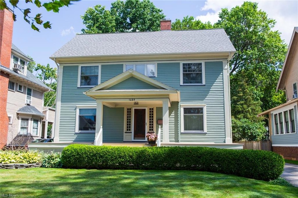 View of front of house with a front yard