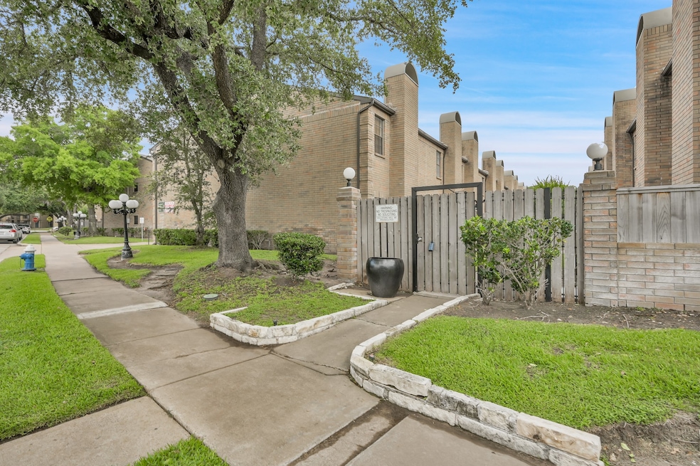 Gated Townhome with lots of green space Gated Entr