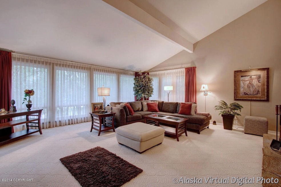 Living room with vaulted ceiling