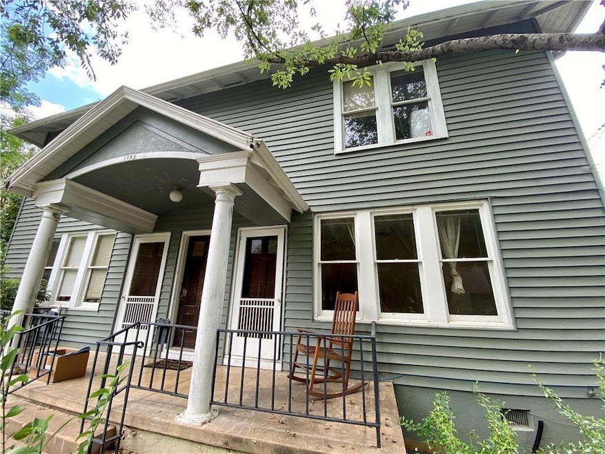 View of front of house featuring covered porch