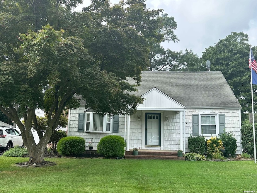 8 Woodland Ave, Holtsville, NY 11742 - photo 1