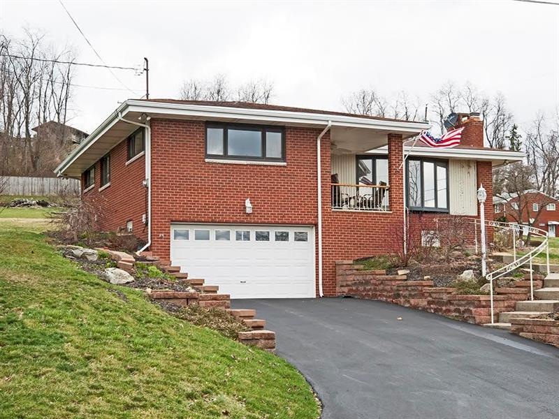 Paved driveway to double over-sized garage. Lots o