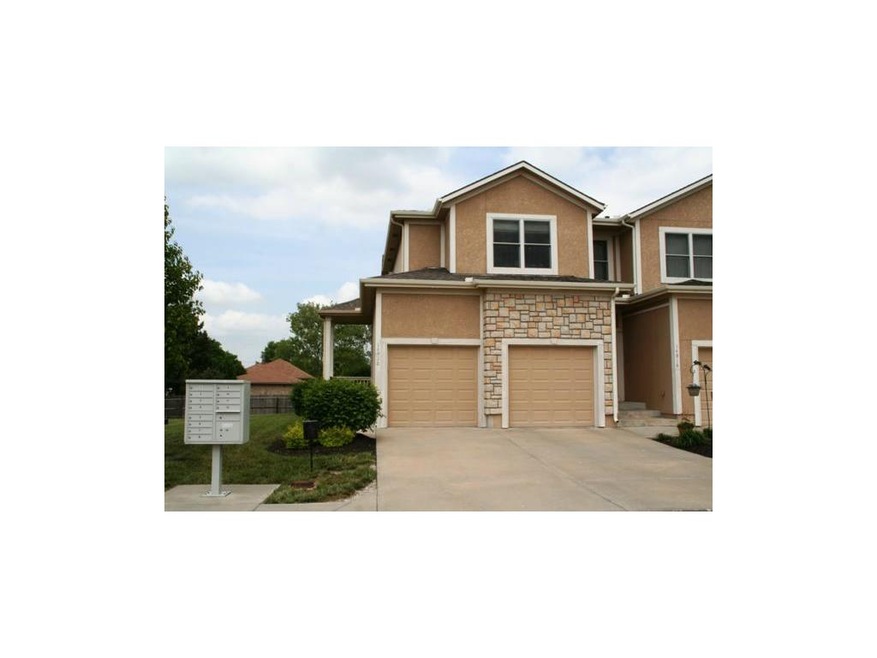 Two car garage end unit.