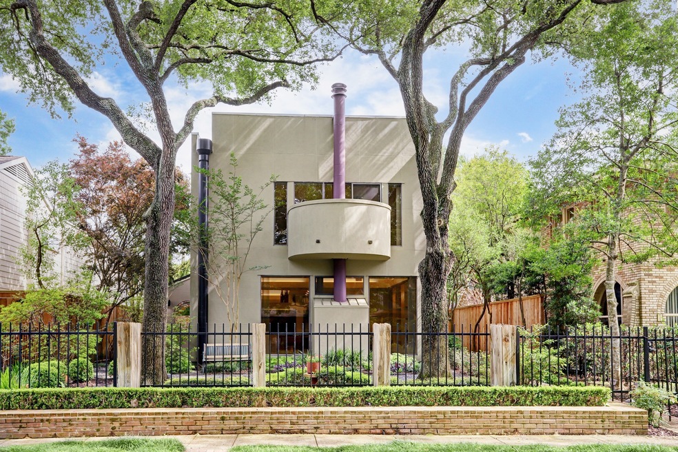 Situated among the leafy canopy of trees in the be