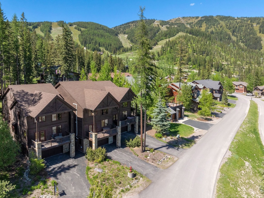 Aerial of 398 Moose Run - on left with Whitefish Mountain Resort in the background