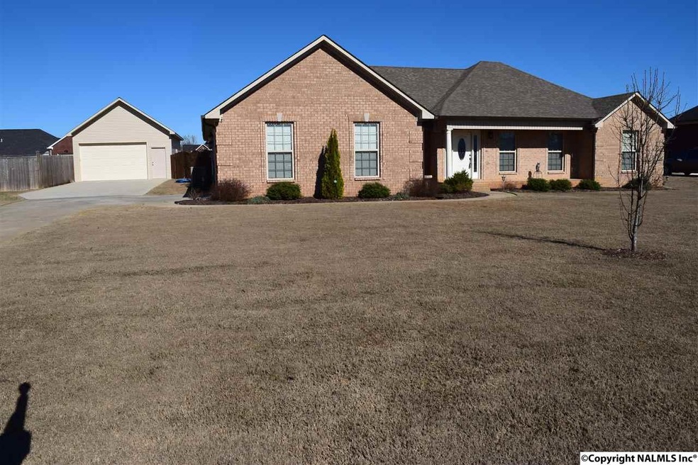 NICE 3 BEDROOM/ 2 BATH BRICK HOME WITH A 2 CAR ATTACHED GARAGE AND A DETACHED GARAGE/WORKSHOP!